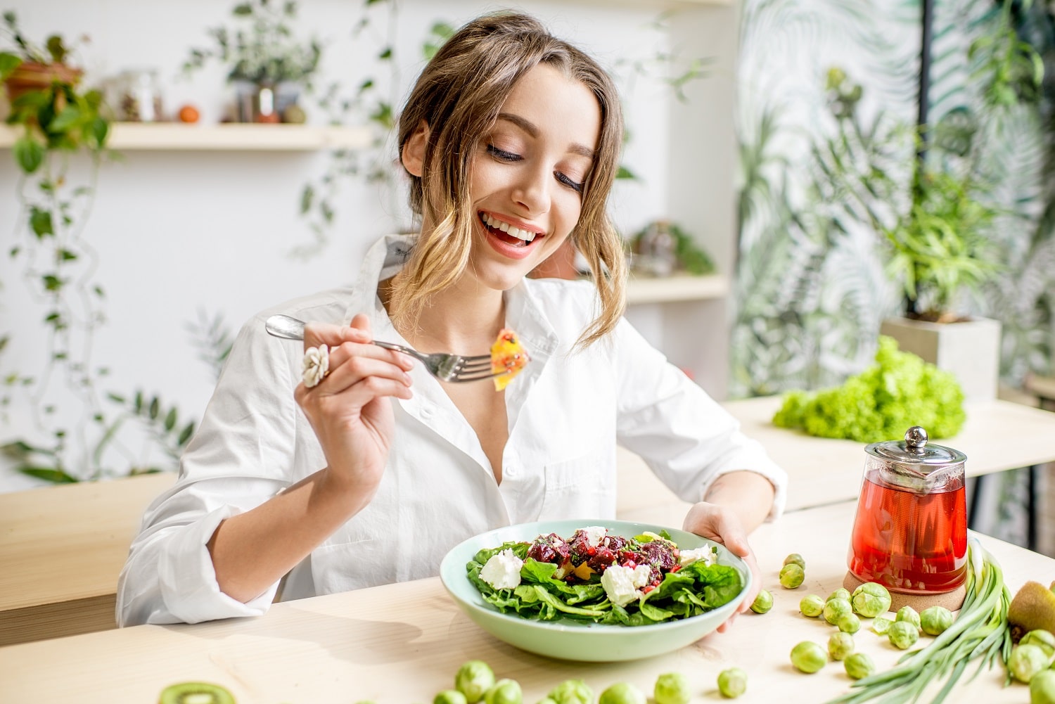 woman-with-healthy-green-food-2021-12-23-15-39-13-utc-min.jpg